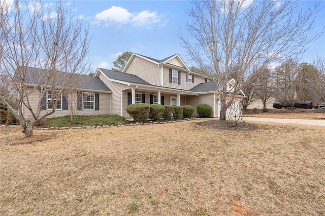 view of property with a front lawn