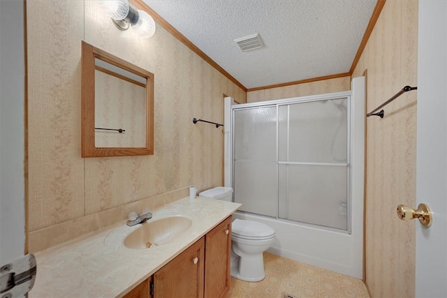 3301 Jones Chapel Rd, Honea Path, SC 29654 - full bathroom with toilet, crown molding, bath / shower combo with glass door, a textured ceiling, and vanity