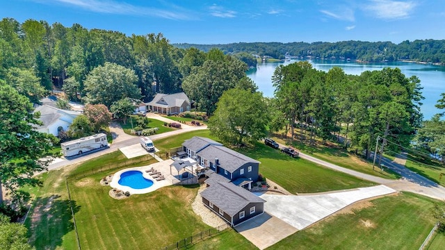 birds eye view of property with a water view