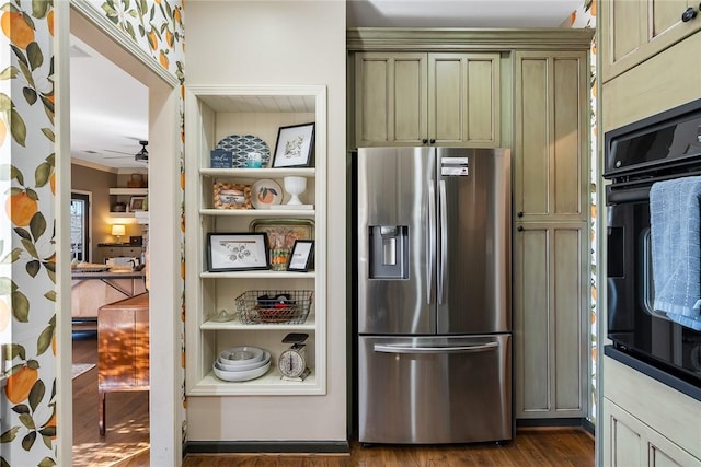 kitchen featuring stainless steel fridge with ice dispenser, dark hardwood / wood-style floors, green cabinets, ceiling fan, and oven