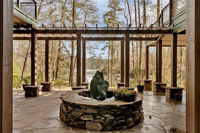 view of patio featuring a pergola
