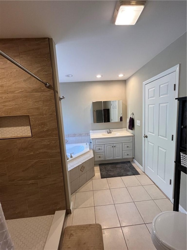 full bathroom featuring tile patterned flooring, vanity, separate shower and tub, and toilet