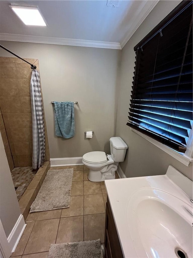 bathroom with crown molding, a shower with curtain, tile patterned floors, and toilet