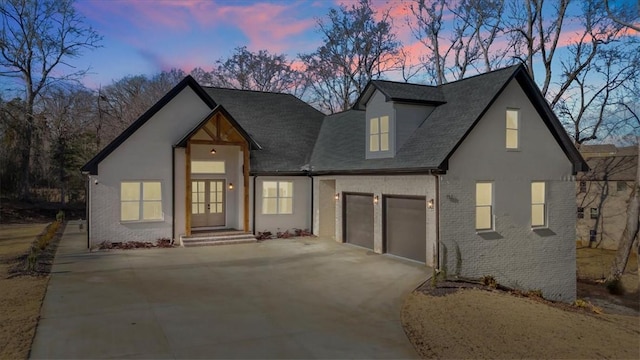 view of front of house with a garage