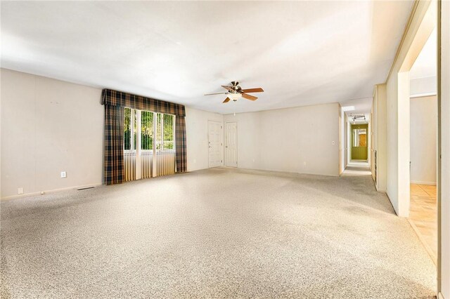 540 Gnats Hollow Rd, Mountain Rest, SC 29664 - empty room with ceiling fan, baseboards, and light colored carpet