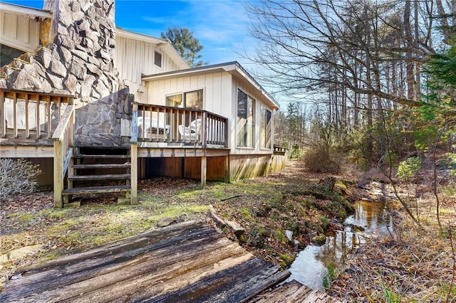 540 Gnats Hollow Rd, Mountain Rest, SC 29664 - view of side of home featuring stairway, a wooden deck, and a chimney