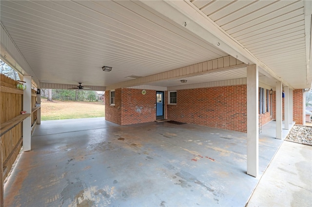 view of patio featuring a carport and ceiling fan