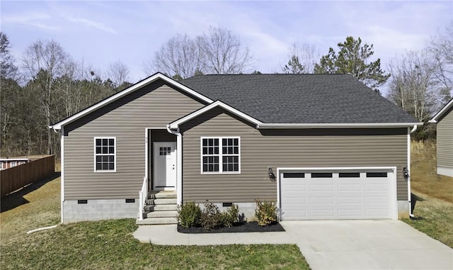 view of front facade featuring a garage and a front lawn