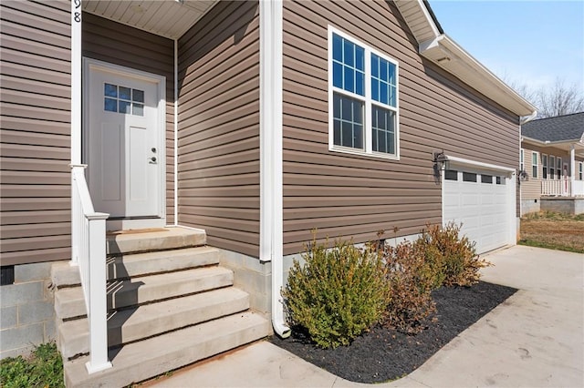 property entrance featuring a garage