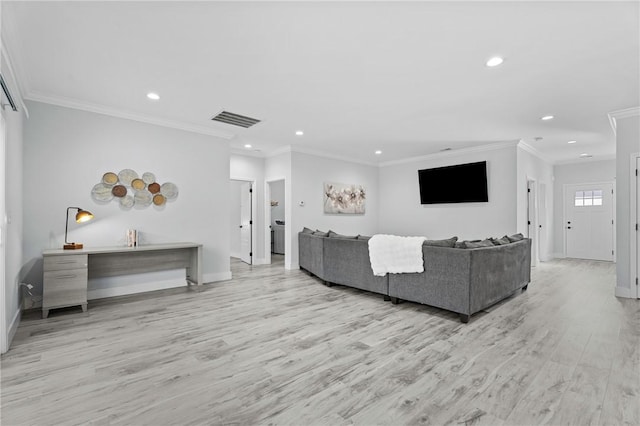 living room featuring ornamental molding and light wood-type flooring