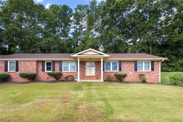 ranch-style home with a front yard