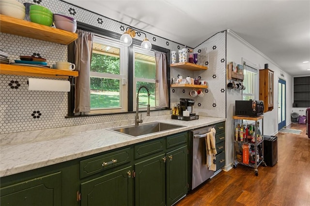 kitchen featuring sink, crown molding, dark hardwood / wood-style flooring, dishwasher, and decorative backsplash