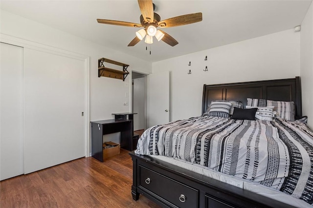 bedroom featuring dark wood-type flooring and ceiling fan