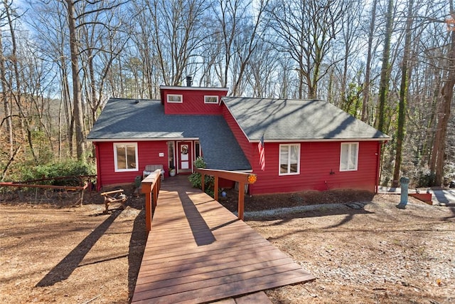 view of front of house featuring a shingled roof