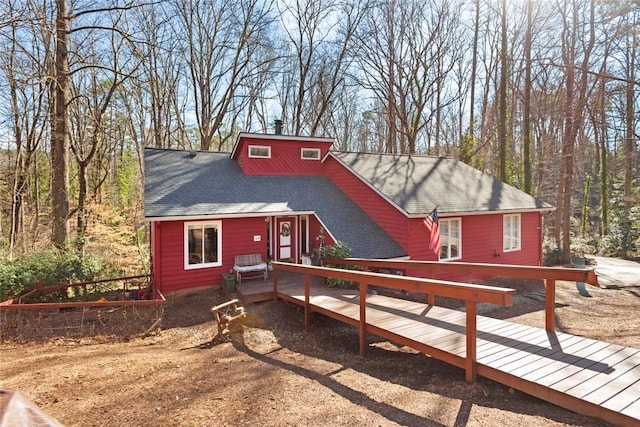 bungalow-style house featuring a deck