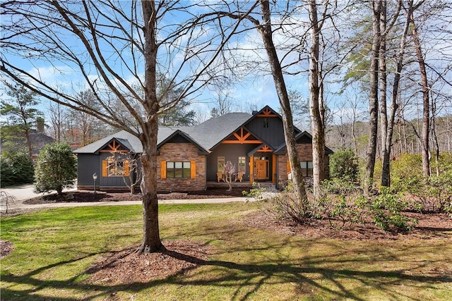 craftsman-style house with a front yard