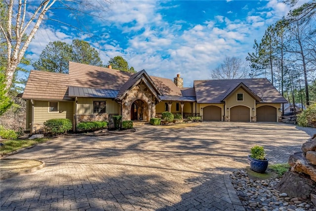 view of front of home with a garage