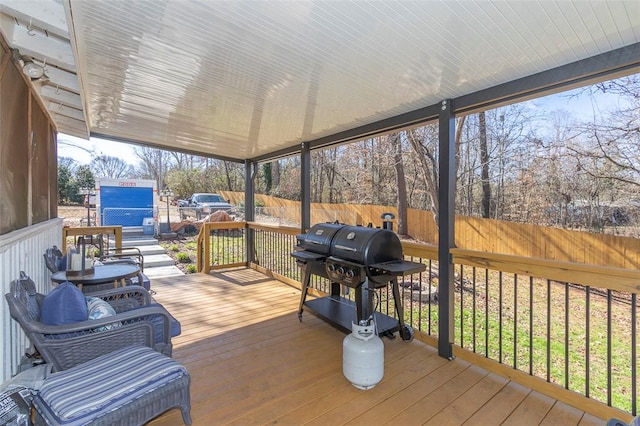 wooden deck featuring area for grilling