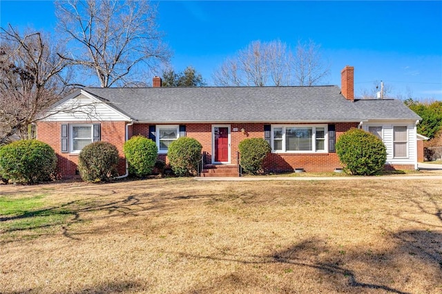 ranch-style house with a front yard