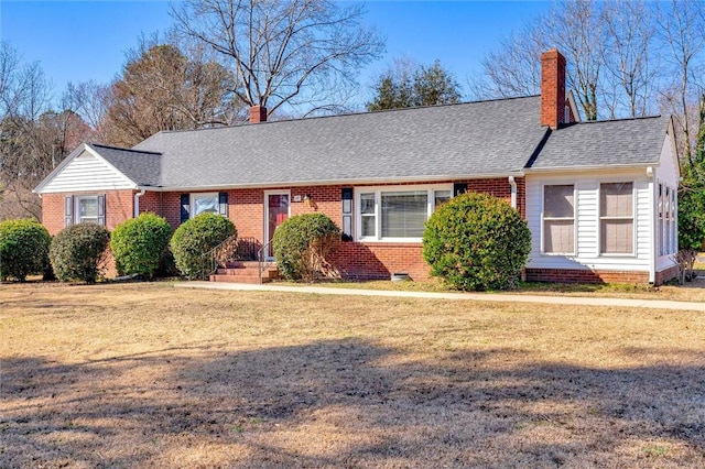 ranch-style house featuring a front yard