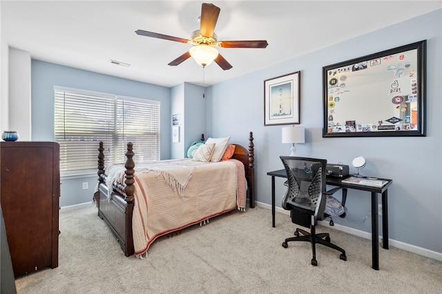 bedroom with ceiling fan and light colored carpet