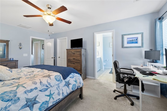 bedroom featuring connected bathroom, ceiling fan, and light colored carpet