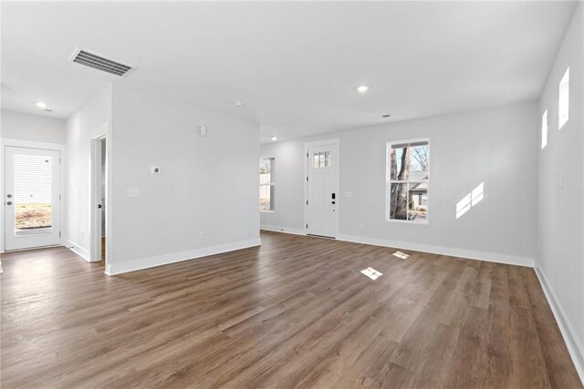 117 Norbert Ln, Anderson, SC 29624 - unfurnished living room featuring dark hardwood / wood-style floors