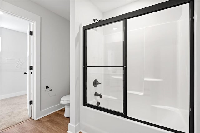 117 Norbert Ln, Anderson, SC 29624 - bathroom with toilet, hardwood / wood-style flooring, and combined bath / shower with glass door