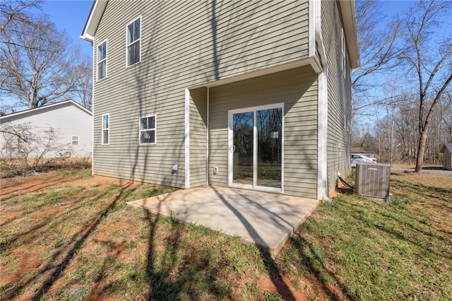 117 Norbert Ln, Anderson, SC 29624 - rear view of house featuring central AC, a patio, and a lawn