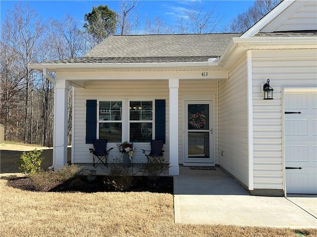 doorway to property with covered porch