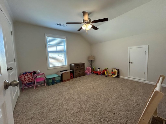 playroom featuring carpet, vaulted ceiling, and ceiling fan