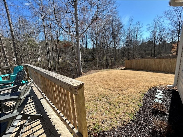 view of yard featuring a wooden deck