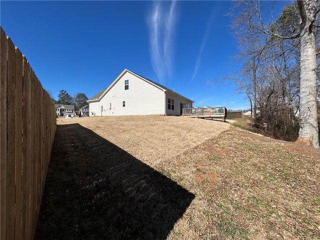 view of yard with a wooden deck