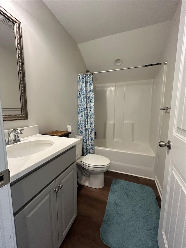 413 Sonoma Ct, Seneca, SC 29678 - bathroom featuring vanity, wood finished floors, shower / bathtub combination with curtain, and lofted ceiling