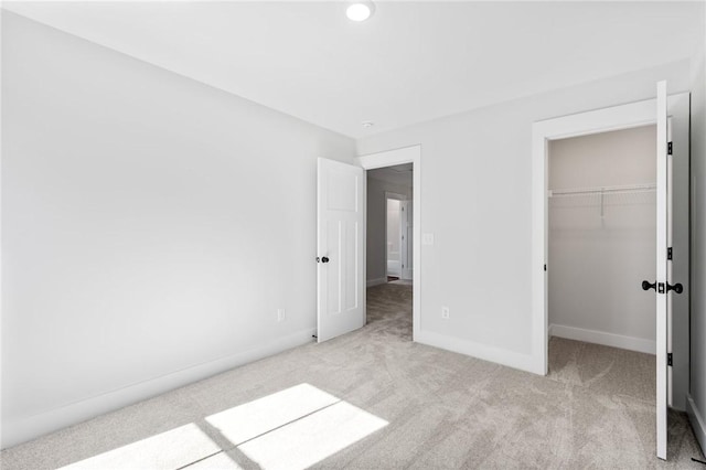 104 Norbert Ln, Anderson, SC 29624 - unfurnished bedroom with a closet, a walk in closet, and light colored carpet