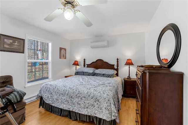 bedroom featuring light wood-type flooring, a wall mounted AC, ceiling fan, and baseboard heating