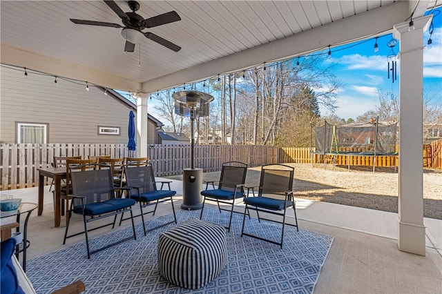 view of patio / terrace featuring a trampoline and ceiling fan