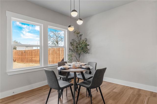 dining space featuring light hardwood / wood-style flooring