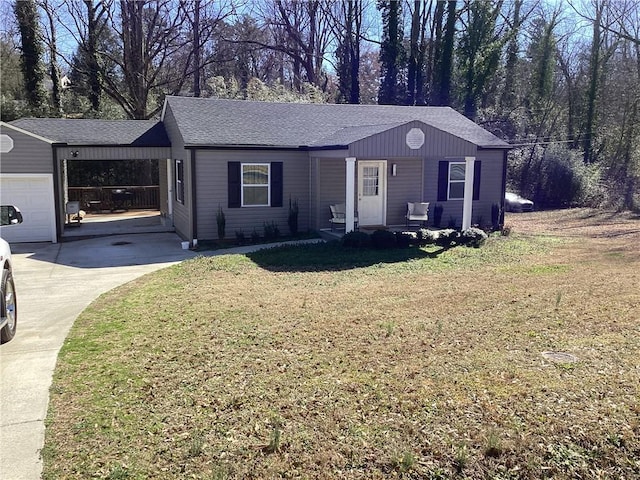 ranch-style house with covered porch, a front yard, and a garage