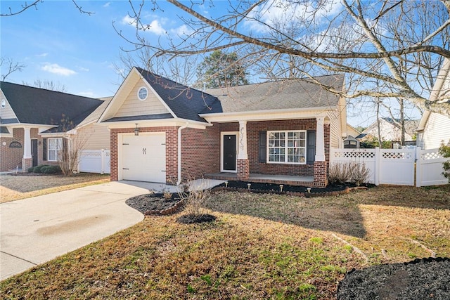 view of front facade with a front lawn and a garage