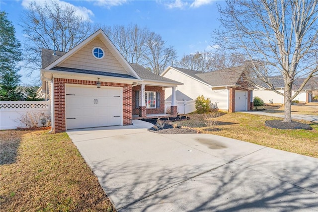 view of front facade featuring a garage and a front yard