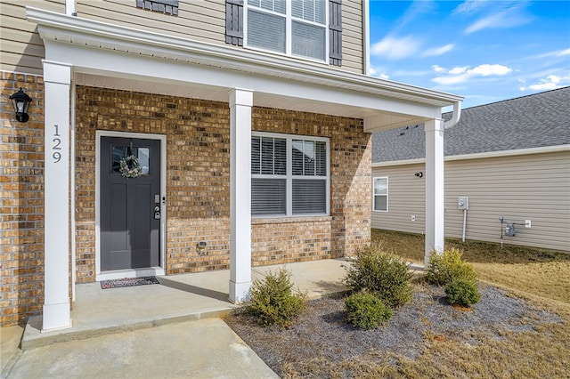 property entrance featuring covered porch