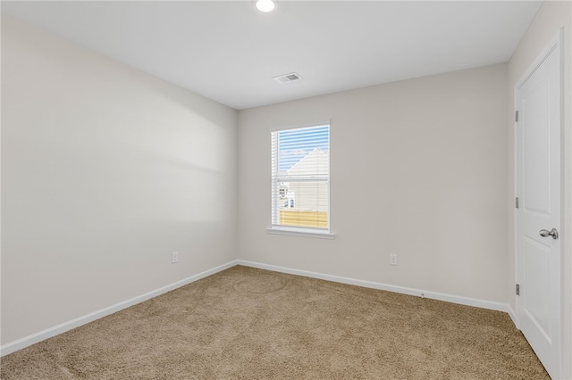 view of carpeted spare room