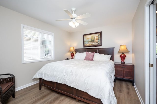 bedroom featuring ceiling fan and wood-type flooring