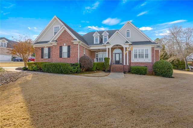 view of front of house with brick siding