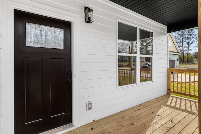 entrance to property with a deck