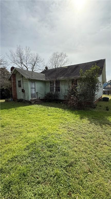 exterior space with a lawn