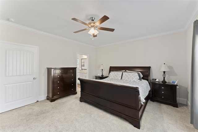 bedroom featuring baseboards, ornamental molding, connected bathroom, and light colored carpet