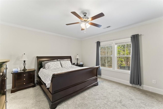 bedroom featuring visible vents, baseboards, a ceiling fan, light colored carpet, and ornamental molding