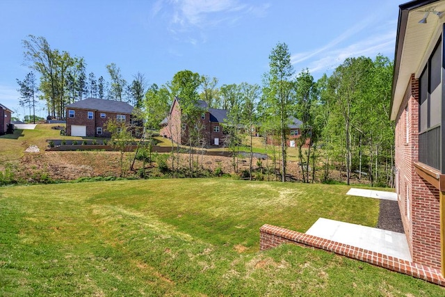 view of yard with a residential view